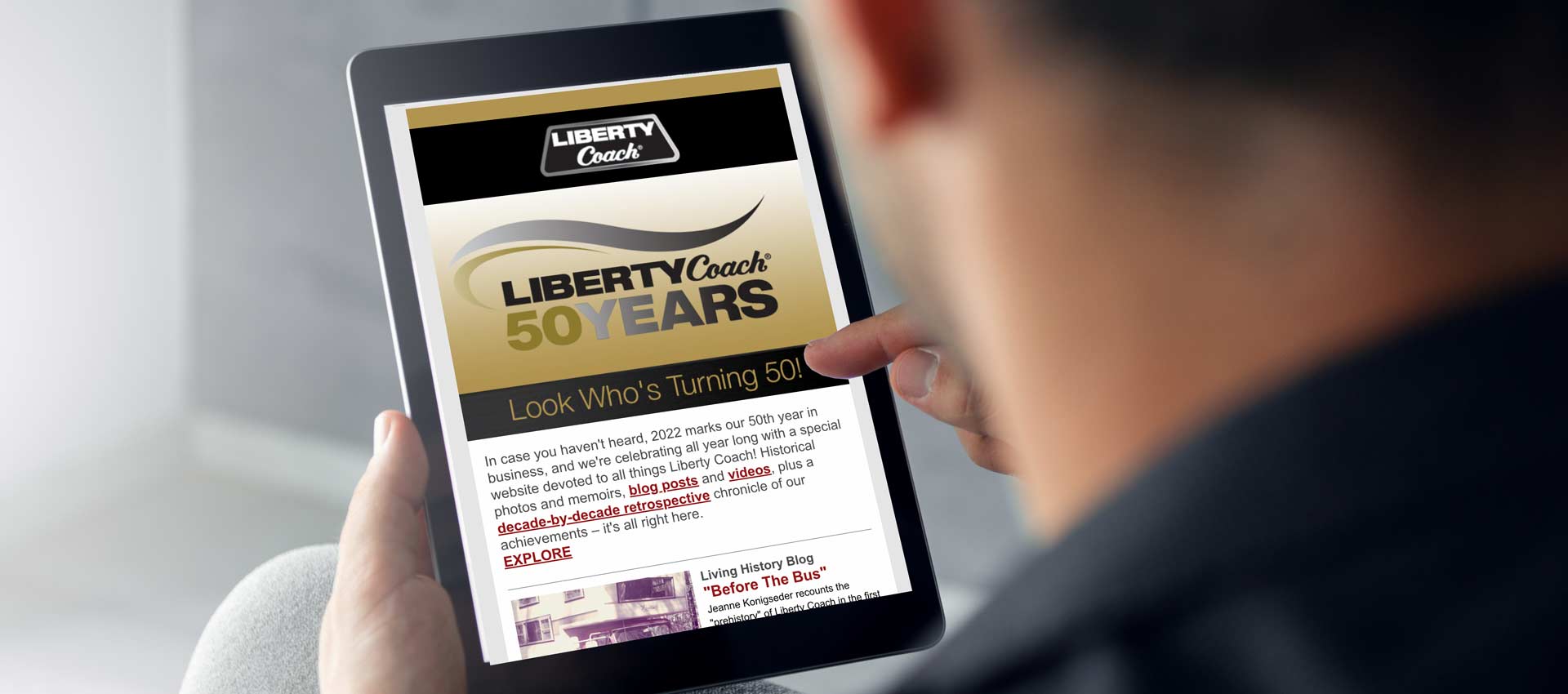 iPad displaying Liberty Coach 50 Year page
